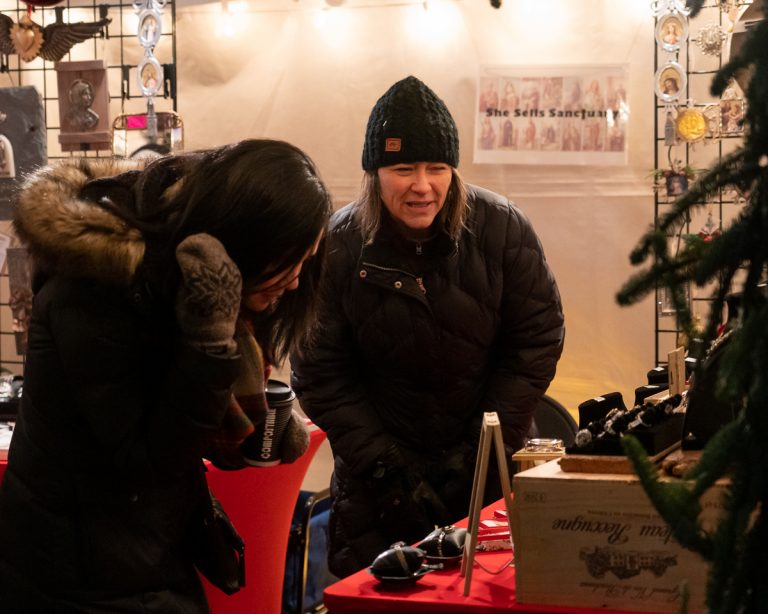 The artists are on hand to answer questions.